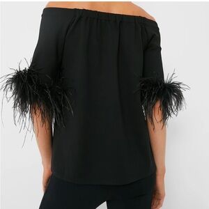 Such a fun top! Worn once for a couple of hours at an event. Tuckernuck size med